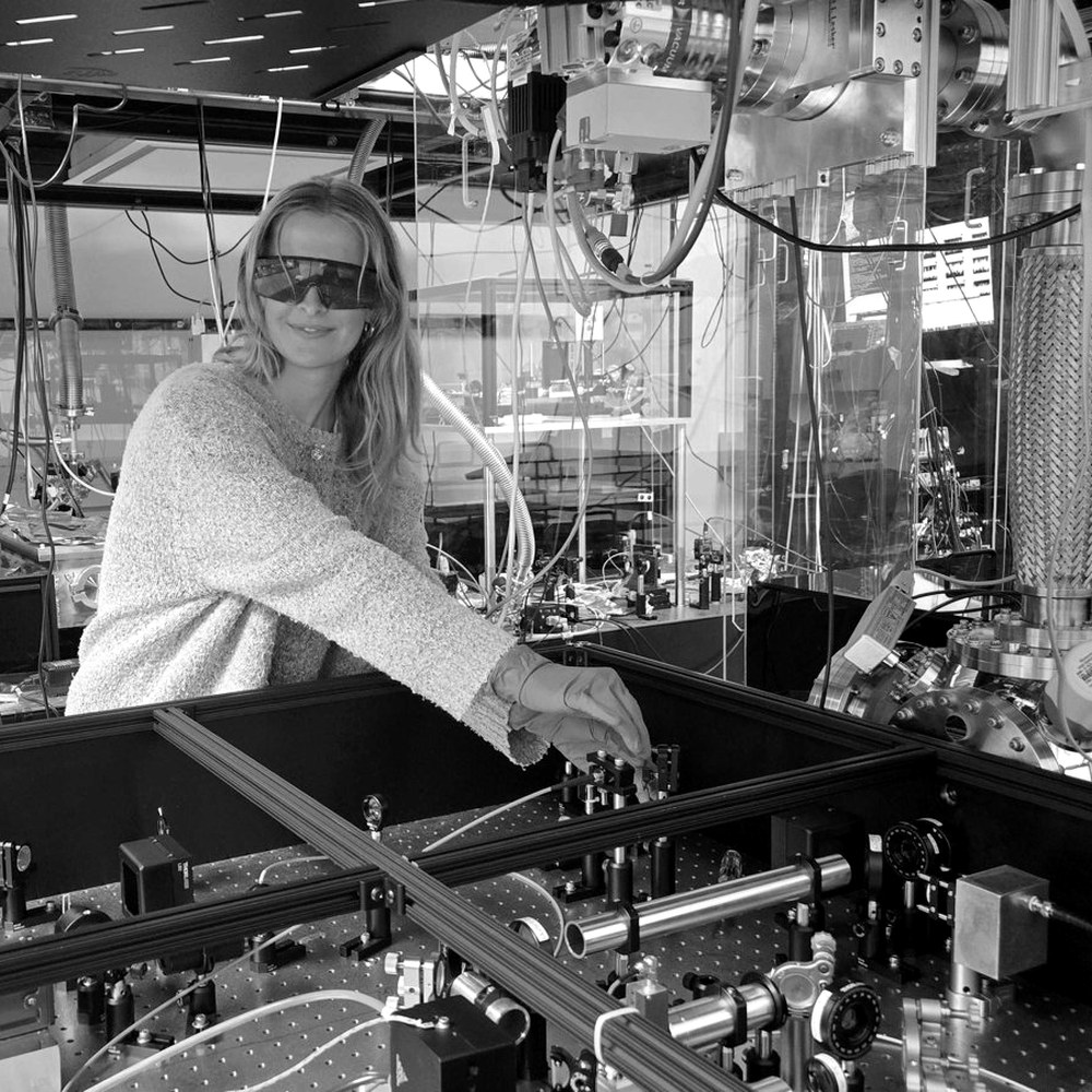 Cecily Lowe at an optical table in the lab.